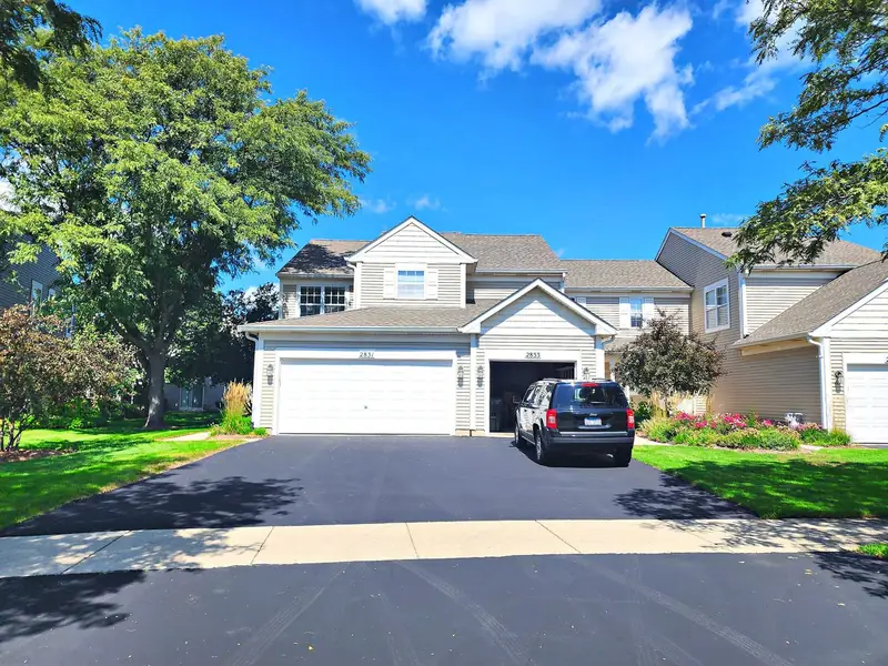 Professionally photographed home with garage